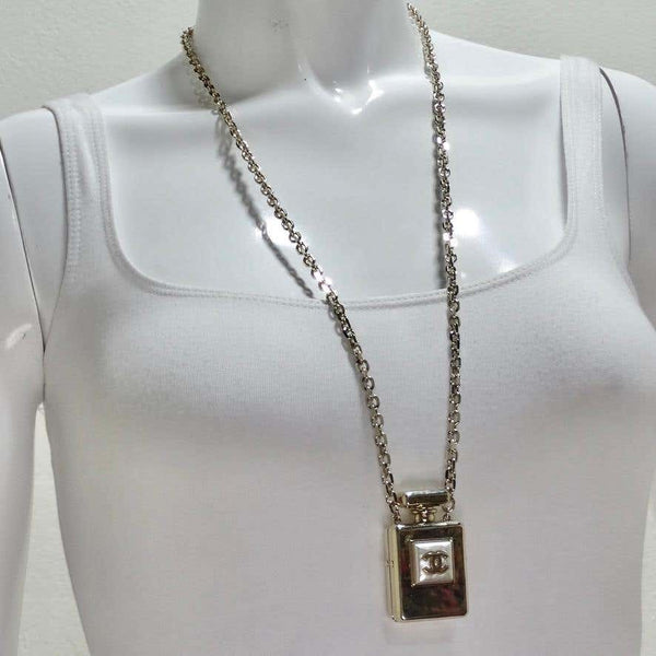 Chanel top perfume necklace