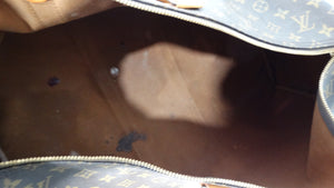 The Louis Vuitton Keepall 55 Monogram Coated Canvas Duffel Bag