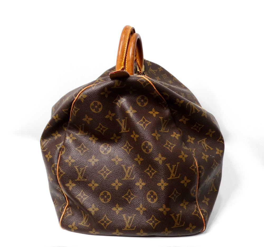 The Louis Vuitton Keepall 55 Monogram Coated Canvas Duffel Bag