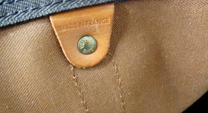 The Louis Vuitton Keepall 55 Monogram Coated Canvas Duffel Bag