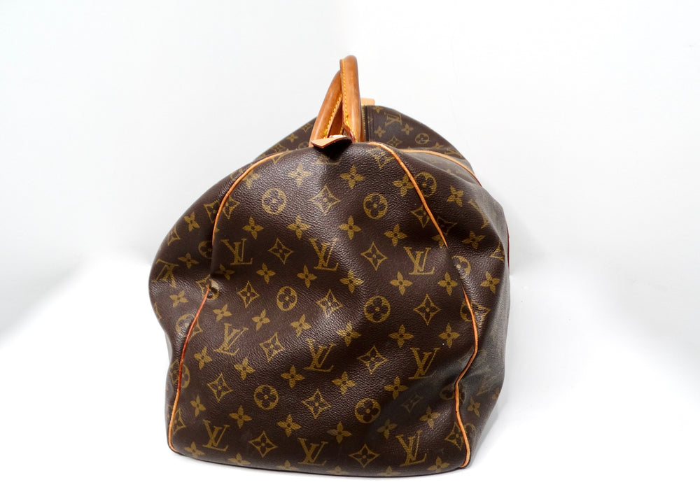 The Louis Vuitton Keepall 55 Monogram Coated Canvas Duffel Bag