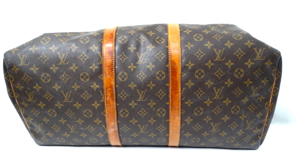 The Louis Vuitton Keepall 55 Monogram Coated Canvas Duffel Bag