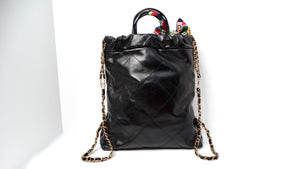 Chanel 22 Black Shiny Calfskin Backpack With Gold-Tone Hardware & Twill