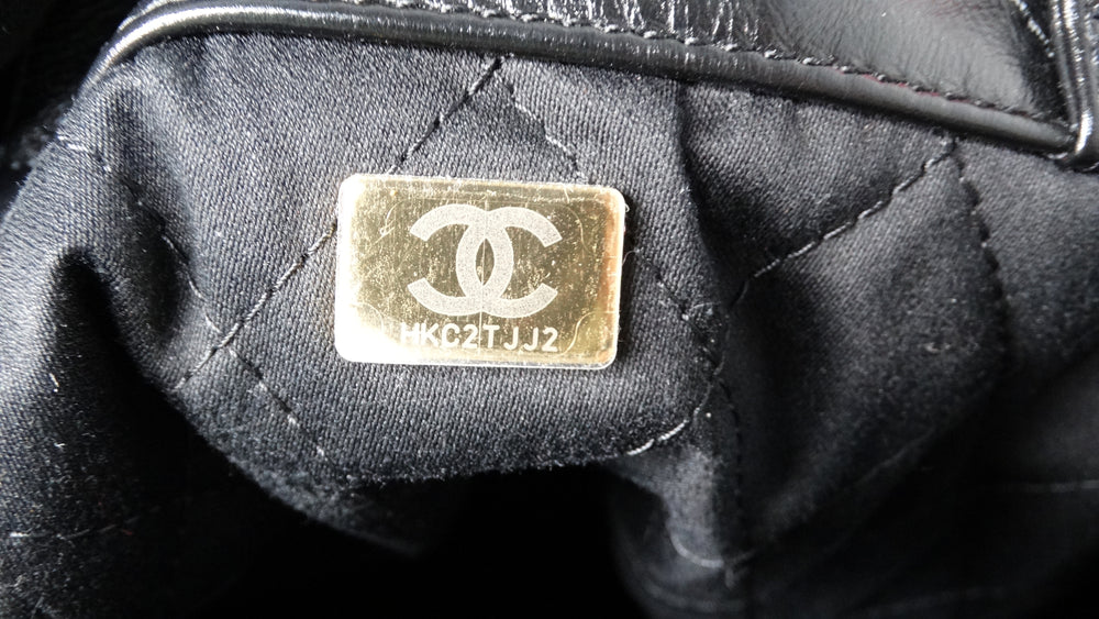 Chanel 22 Black Shiny Calfskin Backpack With Gold-Tone Hardware & Twill