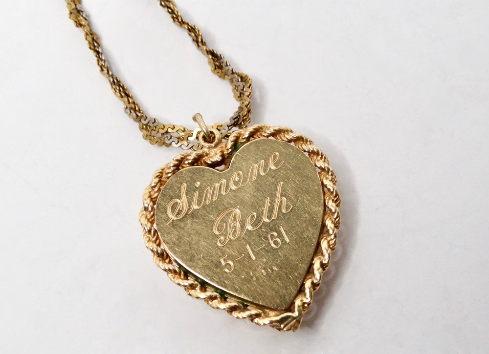 1961 Heart-Shaped Engraved 14k Gold Locket Necklace With Emerald