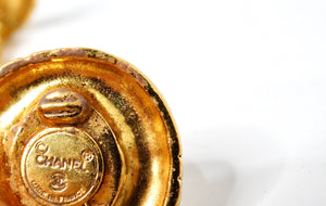 1990s Chanel Round Gold Tone Ribbed Rhinestone Clip-On Earrings