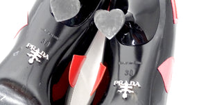 Prada Heart Print Patent Leather Pumps With Heart Shaped Heel