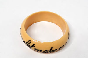 Y2K JKC "Does This Bracelet Make Me Look Fat?" Yellow Resin Bangle