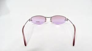 Versace Oval Frameless Purple Lens Sunglasses circa 1990s