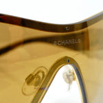 Chanel 1990s Gold Tone Camelia Shield Sunglasses