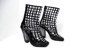 Yves Saint Laurent 2009 Runway Black Patent Leather Cage Boots