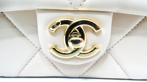 Chanel Beige Quilted Lambskin Interlocking CC Chain Flap Bag 2024