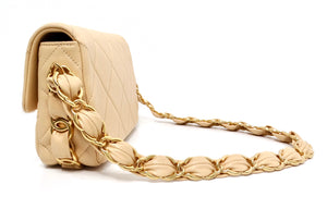 Chanel Beige Quilted Lambskin Interlocking CC Chain Flap Bag 2024