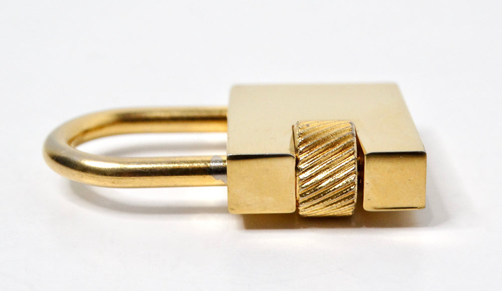 Christian Dior Gold-Tone Logo Engraved Padlock Charm Pendant