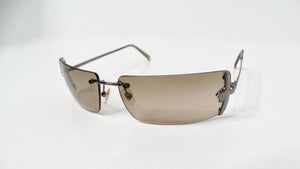 1990s Versace Medusa Brown Tinted Rectangular Rimless Shield Metal Sunglasses