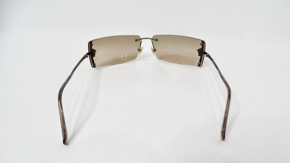 1990s Versace Medusa Brown Tinted Rectangular Rimless Shield Metal Sunglasses