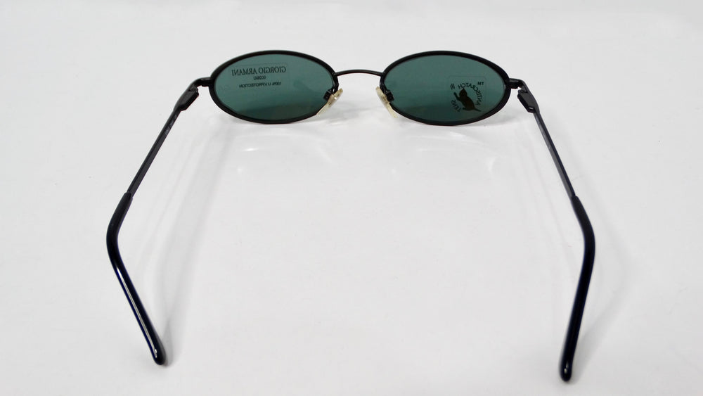 1990s Giorgio Armani Blue Tinted Black Metal Skinny Oval Sunglasses