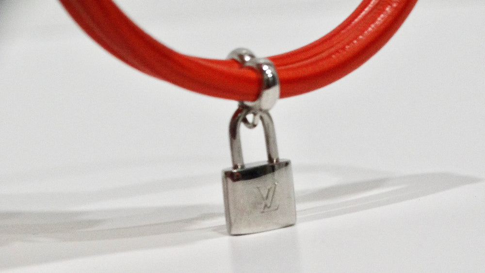 Louis Vuitton Double Leather Chord Bracelet and LV Silver Lock Charm