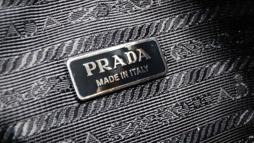 Prada Sole Grace Triangle Leather Pouch