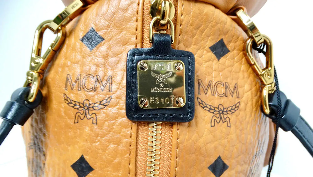 MCM Cognac Calfskin Visetos Bear Zoo Doll Backpack