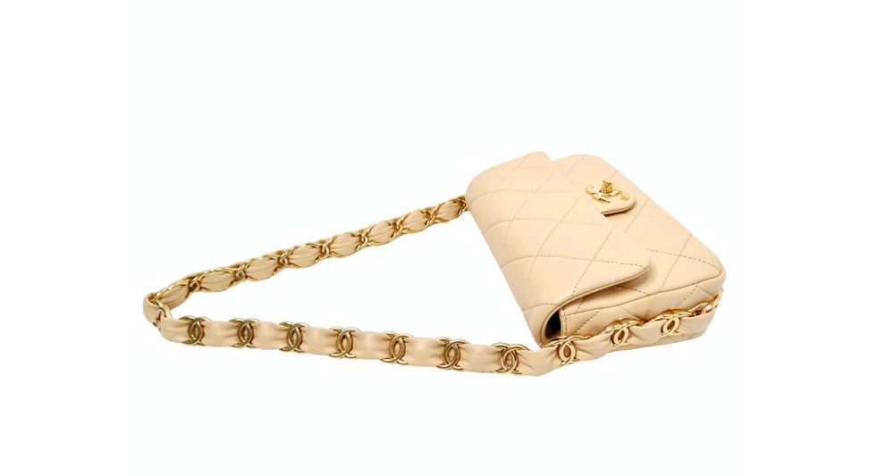 Chanel Beige Quilted Lambskin Interlocking CC Chain Flap Bag 2024