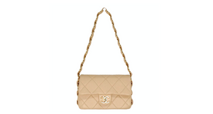 Chanel Beige Quilted Lambskin Interlocking CC Chain Flap Bag 2024
