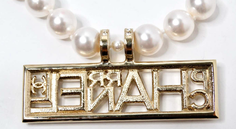 Chanel x Pharrell Williams Crystal Logo Costume Pearl Necklace 2019