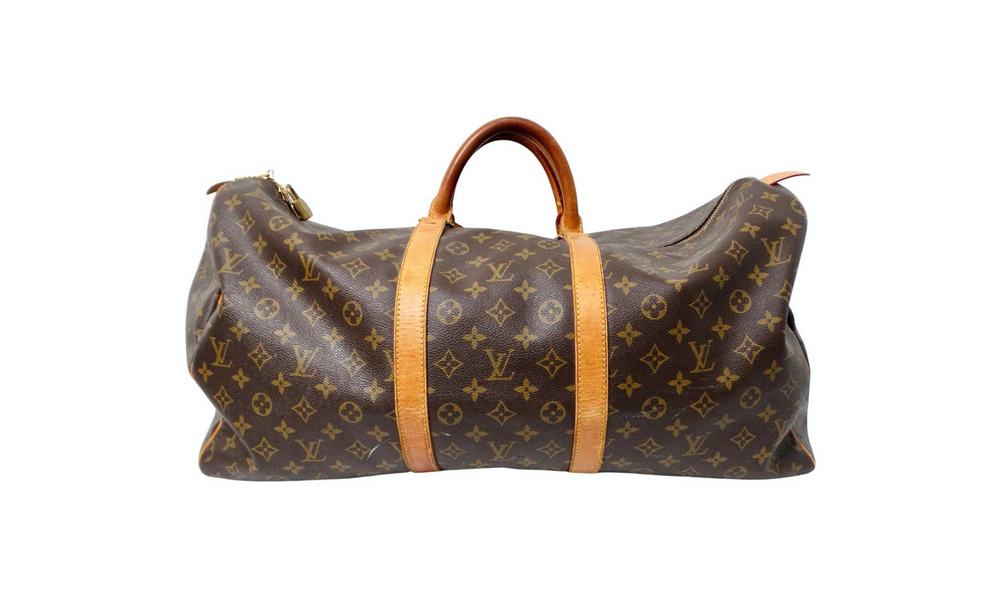 The Louis Vuitton Keepall 55 Monogram Coated Canvas Duffel Bag