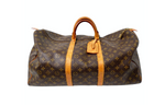 The Louis Vuitton Keepall 55 Monogram Coated Canvas Duffel Bag