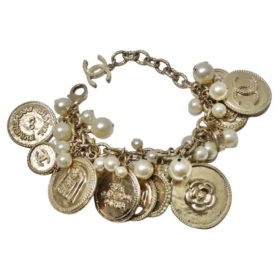 Chanel Vintage Gold And Black Metal CC Medallion Florentine Bracelet, 1993  Available For Immediate Sale At Sotheby's