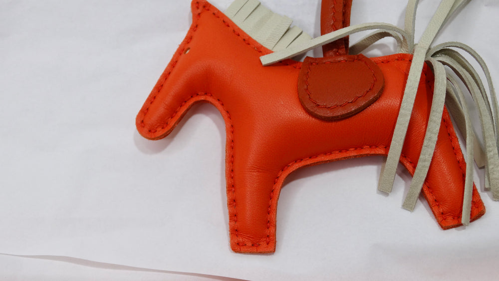 Hermès Orange Lambskin Grigri Rodeo Horse Bag Charm