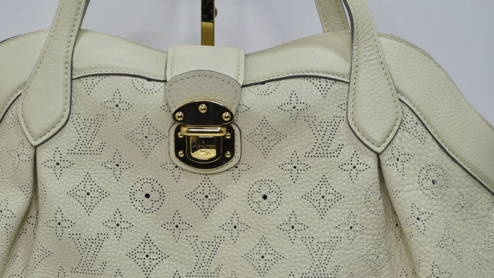 Louis Vuitton Off-White Monogram Mahina Cirrus PM Bag – Vintage by